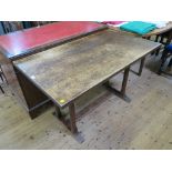 An oak dining table, the rectangular top on chamfered legs and bracket feet, 121cm wide