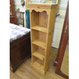 A pine book shelf unit 127cm high