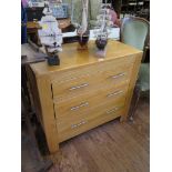 A modern oak chest of drawers with three long drawers, 85cm wide