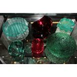 Four coloured glass abstract bowls and two shallow bowls, 11cm to 20cm diameter