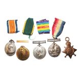 A group of three WWI medals to include 205. A.C. SJT C.T. Fish Suf R.A Territorial Efficiency