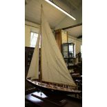 A scale model of a yacht in full sail, retailed by Nauticalia, London, length 100cm, height 148cm