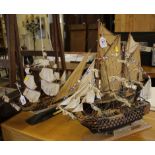 A scale model of HMS Victory, Trafalgar 200 edition, the base made from timber recovered from HMS