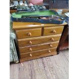 A pine chest of two short and three long drawers on bracket feet, 77cm wide