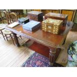 An early Victorian mahogany extending dining table, the rectangular moulded top with extra leaf on