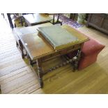 A 17th century style oak side table, the rectangular top over a panelled frieze drawer on bobbin