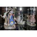 Four Lladro figures, with original boxes: Glorious Spring 05284, Winter Frost 05287, Summer on the