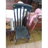 A mahogany towel rail with fret carved sides, and an ebonised country nursing chair (2)