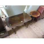 An octagonal mahogany wine table, with quatrefoil veneered top and four downswept legs, 39cm wide,