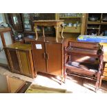 A mahogany veneer two door music cabinet on cabriole legs, another two door cupboard, a two tier