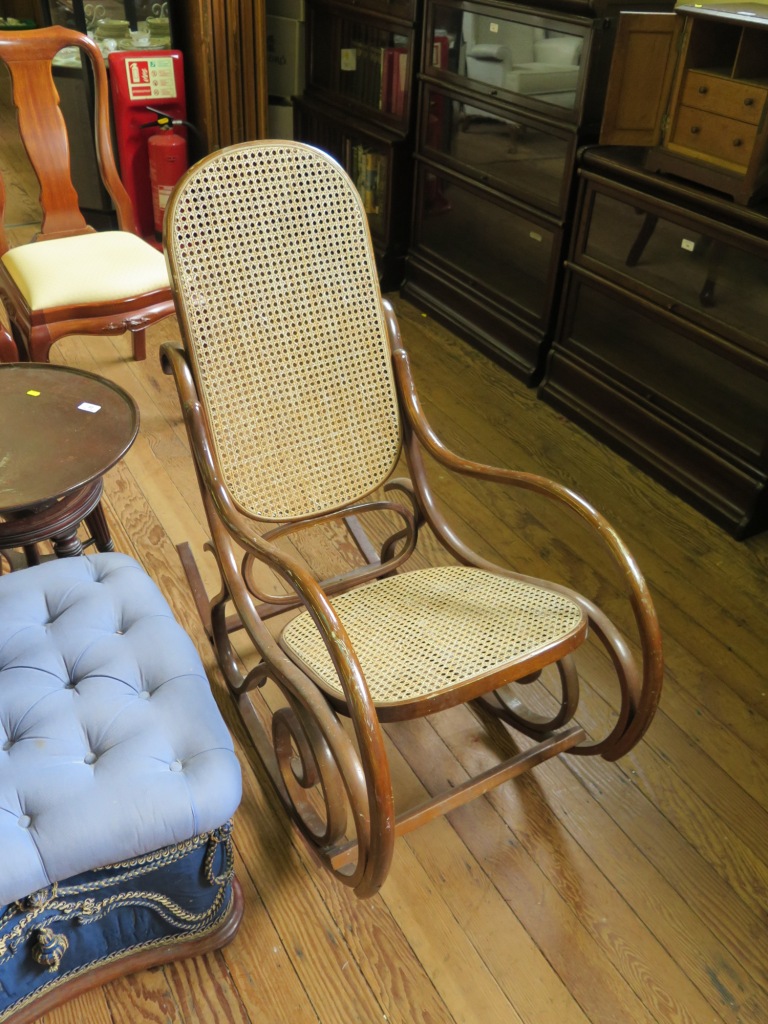 A Bentwood and cane rocking chair