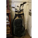 A set of left handed Wilson Blue Ridge golf clubs, with bag