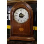 An Edwardian inlaid mahogany cased 'Bulle' battery powered clock, the pointed arch case with