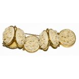 A late Victorian seven plaque carved ivory bracelet (possibly Dieppe)