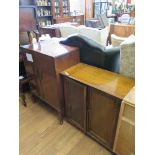 A mahogany veneer two door music cabinet on cabriole legs, another two door cupboard, a two tier