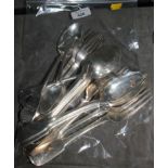 A collection of silver cutlery to include dinner forks, serving spoons, dessert spoons, etc,