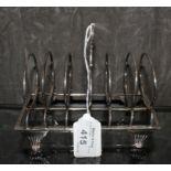 A George III silver toast rack of six divisions, London 1805