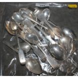 A collection of tea spoons, mixed dates