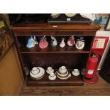 A reproduction mahogany open bookcase, the moulded top over adjustable shelves and plinth base. 96.