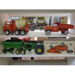 A Tonka Dump Truck no 2315 in original box, a Tonka tractor and trailer and a cement mixer (3)