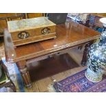 An early Victorian mahogany extending dining table, the rectangular moulded top with extra leaf on