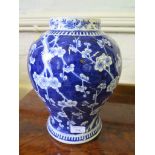 A Chinese blue and white baluster jar depicting cherry blossom, four character Kangxi mark, early