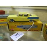 A Dinky yellow and blue 179 Studebaker President in original box with correct end spot