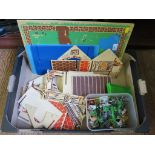 A toy farm including printed plywood yard with buildings and selection of animals, figures and