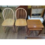 Two Ercol ash Windsor kitchen chairs, a nest of two teak tables and a painted metal trunk