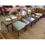 A set of five Victorian stained beech balloon back dining chairs with ring turned tapering legs (5)