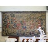 A 19th century woolwork tapestry in the 17th century style, depicting a hunting scene with hawks and