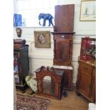 An early 19th century crossbanded mahogany broad longcase clock, the swan neck pediment, with turned