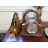 A 1930s boxwood strung shaped mantel clock, the movement by Stewart & Clark, Chicago, 16cm high,