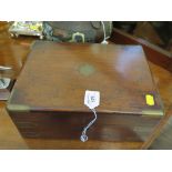 A 19th century rosewood and brass bound sewing box of rectangular form with velvet lined interior,