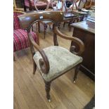 A William IV mahogany carver chair, the broad top rail with scroll arms and upholstered seat on