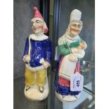 A pair of Victorian Staffordshire figures depicting Punch and Judy, 20cm high (2)