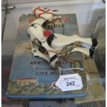A Moko Lesney die-cast Muffin the Mule Marionette and an accompanying book by Annette Mills