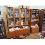 A G-Plan teak side cabinet, with four glazed doors over a base with two pairs of cupboard doors on a