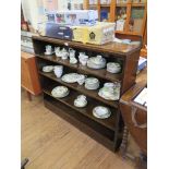 An oak open bookcase, with three adjustable shelves on a plinth base, 122cm wide