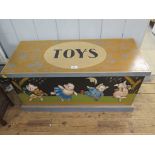 A painted toy chest, applied with dancing pigs to the front, 87cm wide