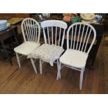 A pair of painted Windsor type single chairs and another painted kitchen chair