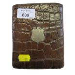 A large crocodile skin cigar case