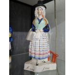 A Victorian Staffordshire figure of a lady in Welsh costume, the base inscribed Jenny Jones, 26cm