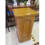 A Victorian burr satinwood bedside cupboard, 39cms wide, 77cms high