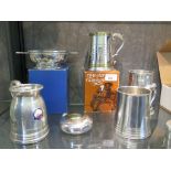 A collection of seven various pewter items, including four tankards, two with original boxes