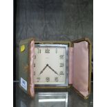 A Harrods 8 day chrome clock in original presentation box (broken main spring)