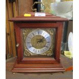 Metamec vinatge mahogany clock with brass dial and silver chapter, mechanical movement striking