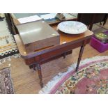 A William IV mahogany foldover tea table with reeded edge and ring turned tapering legs, 91.5cm