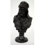 A DECORATIVE BRONZE AFTER THE ANTIQUE BUST OF A BEARDED MAN with headdress, possibly John the