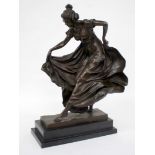 A CONTEMPORARY BRONZE SCULPTURE OF A GIRL rushing forward wearing a long skirt, the sculpture